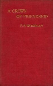 Plain red cover of a book, inscribed "A Crown of Friendship - F.S. Woodley"